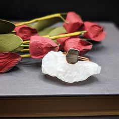 Add a unique touch to your jewelry collection with this Tiny Petrified Wood Ring. This size 5 ring boasts a small piece of petrified wood, giving it a one-of-a-kind look. The copper band adds a touch of warmth, making it perfect for any occasion. Minimalist Brown Rings For Gifts, Minimalist Natural Stone Rings As Gifts, Minimalist Natural Stone Rings Gift, Minimalist Crystal Ring With Natural Stones As Gift, Minimalist Crystal Ring With Natural Stones For Gift, Handmade Earthy Rings As Gifts, Handmade Earthy Style Rings As Gifts, Adjustable Nature-inspired Crystal Ring For Gifts, Earthy Handmade Rings As Gifts