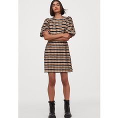 As Seen On Bloggers Such As Lydia Millen And Featured On Pop Sugar’s List Of Best Dresses For Fall, This Body Skimming Beige And Brown Plaid Dress Ends Above The Knee With Elbow Length Puff Sleeves. Round Neckline, Concealed Zipper At The Back, And Fully Lined, This Dress Is A Classic And Elegant Twist On A Neutral Plaid. Dress Down With Black Boots For An Edgy Fall Style Or Flats And A Vest For A Classic Take. New With Tags. Sold Out. Size: Xxl. Materials: 62% Viscose, 23% Lyocell, 15% Polyamid Fall Fashion Edgy, Brown Plaid Dress, Check Tops, Dress H&m, Fall Capsule Wardrobe, Dresses Xxl, Brown Plaid, Classy Chic, Fall 2023