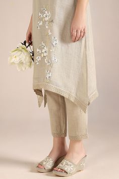 Natural kurta with camelia flower print and crochet lace embroidered cutwork border. Paired with pant. - Aza Fashions Elegant Floral Embellished Sets For Spring, Traditional Floral Print Bottoms For Spring, Traditional Spring Floral Print Bottoms, Beige Floral Embroidered Pants For Spring, Spring Wedding Pants With Floral Embroidery, Beige Floral Print Sets For Spring, Camelia Flower, Women Kurta, Fly Free