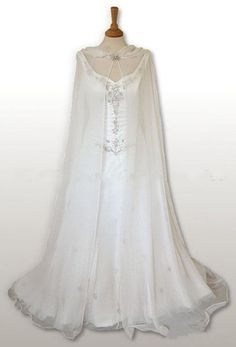 a white wedding gown on a mannequin