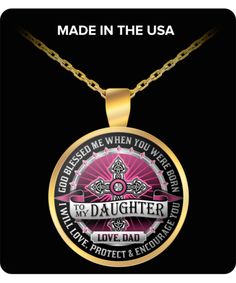 a necklace that says made in the usa with a heart on it and an image of a