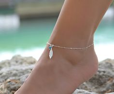 This silver anklet has a solid sterling silver 925 chain. The charm on the ankle bracelet is also sterling silver 925. The anklet has an extension so it can be adjusted to fit comfortably with different shoes. There is an option for the type of stones that you would like on the anklet.I can also customize the size for you, so feel free to message me if you need a custom order , or if you have any questions. Bohemian Sterling Silver Anklets For Gift, Moonstone Anklet, Music Note Jewelry, Turquoise Anklet, Anklet Silver, Silver Ankle Bracelet, Anklets For Women, Silver Anklet, Anklets Boho