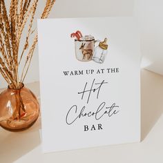 a white greeting card with the words warm up at the hft chocolate bar on it