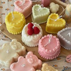 some heart shaped cookies are on a table