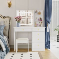 a bedroom with white furniture and blue curtains