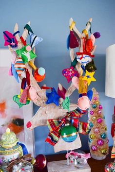 an assortment of christmas decorations on a table