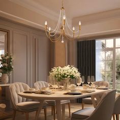 an elegant dining room with chandelier and table