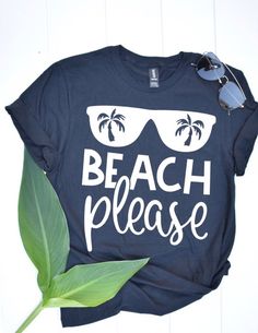 BEACH PLEASE T-SHIRT.Our shirts are high quality and very soft.  See Sizing chart for more details. If you have a customization or request, we can work with our vendors to get you any cut, color, or fit you would like please just leave it in the Custom Notes. *Sizing for T-Shirt*Unisex/Men’s Sizing Recommend Men use true size for a loose fit.*Women size down for a loose fitMaterial- preshrunk 100% combed ring spun cotton. Heather Grey is 90% cotton, 10% polyester; Other heather colors are 65% po Custom Print T-shirt For Beach Vacation, Black Shirt For Beach Season, Blue Letter Print T-shirt For Beach Party, Black Custom Print Shirt For Beach, Black Letter Print T-shirt For Beach Season, Black Text Print T-shirt For Vacation, Black Crew Neck Top For Vacation, Custom Print Shirt For Beach Vacation, Vacation Cotton T-shirt With Custom Print