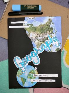 a piece of paper with the word geopoly written on it next to a marker