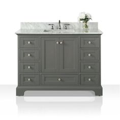 a gray bathroom vanity with two sinks and marble counter tops on the top is shown in front of a white background