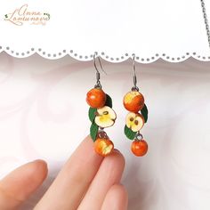 Apple earrings Fruit earrings Summer earrings Miniature food earrings Fruit jewelry gift Food earrings  These fruit earrings will not leave anyone indifferent. They look very cute and original. This apple jewelry can be a good gift for a friend. Each apple and leaf is handmade by me. ✿MADE TO ORDER ✿ Real colors may slightly differ from one monitor to another, as it depends on specific monitor settings. ✿ All my jewelry packed in a gift box ♥ Thank you for visiting my shop.♥ *To see more items please click here: http://etsy.me/2nnrK5N *Before shopping, don't forget to read my Policies: http://etsy.me/2nspiYK Fruit Design Drop Earrings As Gift, Fruit Design Drop Earrings For Gift, Cute Fruit Design Earrings For Gift, Orange Fruit Design Earrings As Gift, Apple Jewelry, Apple Festival, Apple Earrings, Fruit Jewelry, Food Earrings