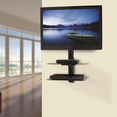 a flat screen tv mounted to the side of a wall