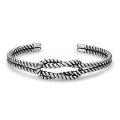 We love the simplicity of the Square Knot Rope Cuff Bracelet. The cuff bracelet is made of two silver finished twisted ropes that loop through each other to interlock creating the top of the cuff. The antique of the silver tone showcases each twist of the rope creating a bold design that will complement any outfit. One size fits most. Montana Armor Protective Coating Square Knot Bracelets, Knot Rope, Western Bracelets, Girl Cowboy Boots, Square Knot, Broken Chain, The Square, Bold Design, Bracelets And Charms