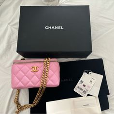 Beautiful Authentic Pink With Gold Hardware Chanel Vanity Bag, Still Has The Sticker On The Mirror Inside,Some Wear To The Corners On Zipper Fabric Due To Color Transfer.Bag Is Overall In Well Condition Has One Scratch On The Back Of Heart Adjuster.Can Be Worn On Your Shoulder Or Crossbody.Comes Microchipped With Box,Dust Bag And Tags!! Chanel Vanity Bag, Vanity Bag, Gold Hardware, Chanel Bag, Dust Bag, Vanity, Chanel, Pink, Fabric