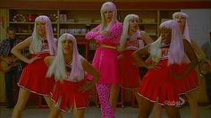 the mean girls are dressed in pink and red