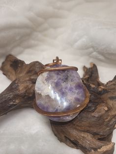 Natural Amethyst Stone Pendant ♥ Increases nobility ♥ Spiritual awareness ♥ Psychic abilities ♥ Inner peace and healing ♥ Healing of body, mind & soul ♥ Positive transformation ♥ Meditation ♥ Balance ♥ Relieves stress ♥ CommunicationDetails: Handcrafted Item using Copper with Cold Forge Wire Wrap technique. This pendant measures 2 1/2 inch on Length incuding Bail, and 1 1/2 inches wide at top. Material: Natural Amethyst, Copper One Of A Kind - Ships within 1-3 Days Securely Packaged. Your Choice Handmade Round Crystals For Meditation, Amethyst Crystal Healing Necklace With Round Pendant, Spiritual Fluorite Jewelry For Meditation, Mystical Round Crystal Necklaces For Healing, Mystical Purple Jewelry For Meditation, Healing Crystals Pendant, Spiritual Amethyst Crystal For Gift, Spiritual Healing Natural Stone Crystals, Spiritual Mineral Crystal For Meditation