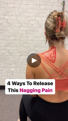 a woman sitting on the floor with her back to the camera and text reading 4 ways to release this nagging pain