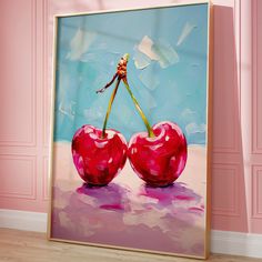 a painting of two cherries on a pink wall