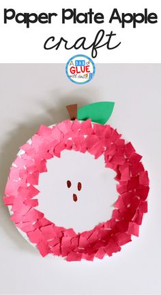 a paper plate apple craft made with pink construction paper