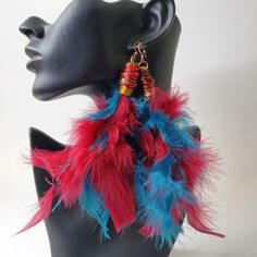 "All Wrapped Up " Beautiful mixed turkey feather earrings  Length: 5.5 - 6" Material:Wire, feather  FYI ➡️ Proper care and storage will help extend the life of your jewelry. Bohemian Feather Earrings For Party, Blue Feather Earrings As Gift, Turkey Feather Earrings, Blue Feather Earrings For Gift, Multicolor Feather Earrings For Gift, Blue Feather Earrings Gift, Elegant Feather Dangle Earrings, Elegant Brown Feather Earrings, Multicolor Feather Earrings Gift