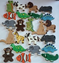 a bunch of different shaped cookies sitting on top of a table