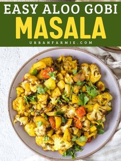 Make your weeknight dinner ideas stress-free with this Easy Aloo Gobi Masala! This comforting dish combines cauliflower and potatoes in a spiced tomato sauce. With just 15 minutes of prep and let the oven do the work, it’s perfect as a hearty side or a filling for wraps. Quick, healthy, and bursting with flavor! Gobi Masala Recipe, Gobi Masala, Aloo Gobi Recipe, Gobi Recipe, Vegan Entree Recipes, Cauliflower Roasted, Gobi Recipes, Vegan Curry Recipes, Indian Recipes Authentic