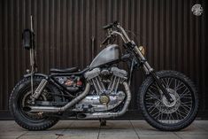 a motorcycle parked in front of a building