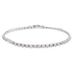 One Art Deco French Diamond Platinum Bracelet. Featuring 25 old European cut diamonds with a total weight of approximately 2.00 carats, graded near-colorless, SI clarity. Crafted in platinum with French hallmarks. Circa 1920. The bracelet is 7 ⅛ inches in length. About this Item: Elevate your wrist game with our sleek Art Deco diamond bracelet. Adorned with 25 captivating old European cut diamonds, totaling approximately 2.00 carats, each diamond exudes a subtle brilliance with near-colorless hu Bracelet Art, Platinum Bracelet, Wrist Game, First Art, European Cut Diamonds, Art Deco Diamond, Link Bracelets, Diamond Bracelet, Diamond Cuts