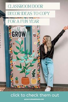 a woman standing in front of a classroom door decorated with plants and potted plants