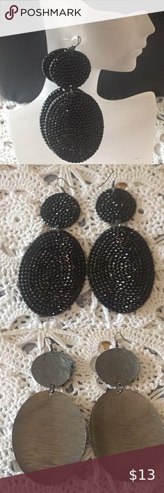 New Large Bold Black Sparkly Pierced Earrings New large, bold earrings with a dangle style and sparkle. In height, they measure 4 1/4 inches. Jewelry Earrings Trendy Black Beaded Earrings, Trendy Black Dangle Beaded Earrings, Trendy Black Beaded Earrings For Party, Black Metal Drop Beaded Earrings, Black Beaded Party Earrings, Black Beaded Earrings For Evening, Handmade Black Crystal Earrings For Party, Bold Earrings, Bold Black