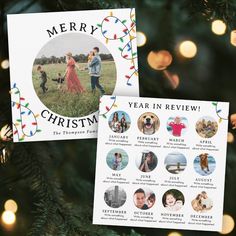 two christmas cards with pictures of people and dogs on them, hanging from a christmas tree