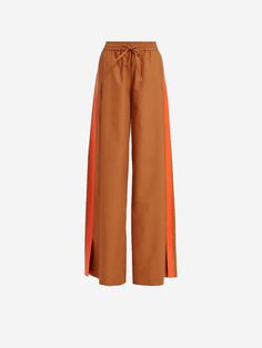 70% cotton, 30% polyester  Elasticated waistband with drawstring  Side pockets  Contrasting side band   Size & Fit: Regular fit  Model is 174 cm tall and wears size 36 Orange Pants, Pleated Trousers, Fleetwood Mac, Pantalon Large, Pants Design, Sweater Coats, Women Brands, Birkenstock, Leg Pants