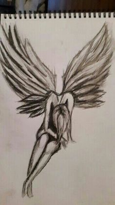 a pencil drawing of an angel with wings