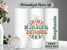 three personalized nurse gifts are on display next to a vase with pink roses in it