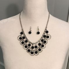 Fun Bib-Style Silvertone Necklace With Black Beads And Matching Black Drop Earrings. Never Worn, 18 In Long And Looks Great With Scoop Neck Tops Or Even Turtlenecks. Silver Dangle Jewelry With Black Beads, Black Metal Jewelry With Dangling Beads, Black Jewelry With Dangling Round Beads, Black Drop Earrings, Scoop Neck Top, Earrings Color, Black Beads, Bead Necklace, Womens Jewelry Necklace