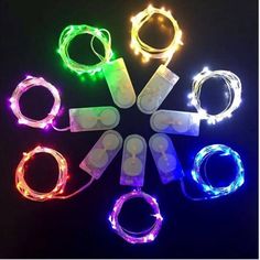 several different types of christmas lights on a black background