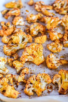 roasted cauliflower florets on a baking sheet