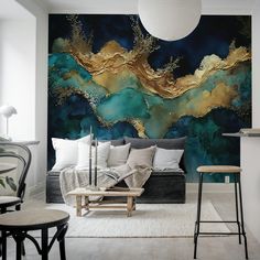 a living room filled with furniture and a large painting on the wall behind it's headboard