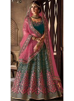 Teal and Pink Embroidered Velvet Lehenga features a beautiful velvet lehenga alongside a net pallu. Embroidery work is completed with zari, thread, and stone. Beautiful Lehangas, Bride Lehenga, Velvet Dupatta, India Style, Pinup Style, Pink Lehenga, Embroidered Lehenga