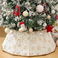 a decorated christmas tree with ornaments on it