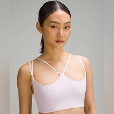 Condition: Bnwt Size: 6 Color: Meadowsweet Pink Style Number: Lw2dyqs Release Date: 12/2023 Material: Nulu Almost Too Pretty To Sweat In. Soft And Strappy, With Plenty Of Coverage And Stretch, This Bra Is A Strong Choice For A Deep And Dynamic Practice. Feels Buttery-Soft And Weightless, Nulu Fabric So Buttery Soft, It Feels Weightless Four-Way Stretch Sweat-Wicking Breathable Added Lycra Fibre For Stretch And Shape Retention Features Soft, Brushed Underband Pockets For Optional, Removable Cups Pink Bra Friendly Top For Pilates, Bra Friendly Pink Tops For Pilates, Sports Bra For Pilates In Spring, Spring Sports Bra For Pilates, Sports Bra With Built-in Bra For Spring Relaxation, Pink Sweat-resistant Sports Bra, Pink Sweat-resistant Sports Bra For Yoga, Pink 4-way Stretch Sports Bra For Athleisure, Pink Activewear With Built-in Bra