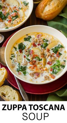 two bowls of soup with bread on the side