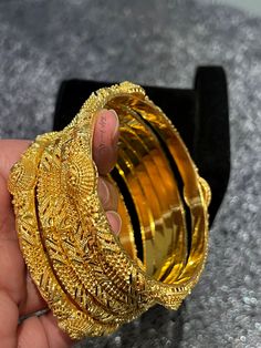 24ct Gold plated high quality bangles looks like real gold. Excellent quality bangles.  Set of 6 bangles.  Check my shop policy before making any purchase. Gold Bangle For Festivals, Gold Stackable Bangle For Festivals, Stackable Gold Jewelry For Festivals, Traditional Gold Stackable Bangle, Traditional Gold Plated Bangle, Traditional Gold-plated Gold Bangle, Traditional Gold-plated Bangle, Gold Stackable Bangle, 22k Gold Round Bangle