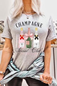 Champagne Social Club Graphic T Shirts.Unisex Crew Neck Short Sleeve Tees.Crafted from premium materials, tailored to your lifestyle, ensuring a comfortable fit for any occasion.Family Group Uniforms Birthday Party Gift Concert Festival Events.High Quality Direct To Film Printed Graphic Design.100%COTTON,HEATHER(52%COTTON,48%POLY),ATH.HEATHER,BLACK HEATHER(90%COTTON,10%POLY)NICARAGUAMade In: Nicaragua Black Letter Print Top For Party, Casual Short Sleeve Party Shirt, Casual Short Sleeve Shirt For Party, Spring Party T-shirt With Crew Neck, Casual Party T-shirt With Text Print, Casual Graphic Print T-shirt For Party, Casual Text Print T-shirt For Party, Black Graphic Tee For Party, Party T-shirt With Text Print And Short Sleeves