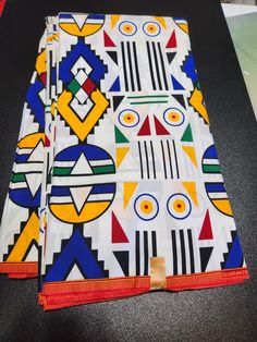 DESCRIPTION African Ankara Fabric. This is high quality African print is 100% cotton and it's 45 inches wide. It is used for making African Clothing, African quilts, & For Home decoration. FYI: Print is Double sided. The listing is for 3yards and 6yards Each piece of fabric measures: 105 - 108in by 45in for 3yards 210 - 216in by 45in for 6yards If you purchase more than one yard, you will receive one continuous piece. *If you require more than what I have listed, feel free to send me email. CARE Ankara Fabric With Multicolor Print, Black Ankara Fabric With Colorful Pattern, Multicolor Ankara Fabric With Abstract Pattern, Printed Orange Ankara Fabric, Clean And Press, Vibrant Patterned Ankara Fabric, African Quilts, African Ankara, Head Wrap Headband