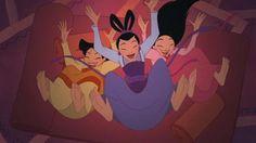 an animated image of three women on a couch with their hands up in the air