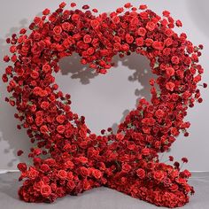 a heart made out of red roses