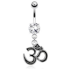 a silver belly ring with an omen symbol on the end and a crystal stone in the middle