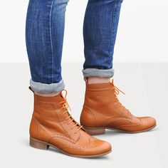 "A classic lace-up silhouette has been constructed from sunny brown leather with smart brogue detailing. These boots feature an almond toe and low heel, rounding them off as a must for your winter style. Upper & lining - leather, sole - synthetic rubber, lace-up fastening, shaft height 16 cm / 6.3\", heel - 2.5 cm / 1.0\" --------Size Conversion & Feet Measurements------- EU 34 US 4.0 UK 1.0 | 22.5 cm / 8.85\" EU 35 US 5.0 UK 2.0 | 23.0 cm / 9.05\" EU 36 US 6.0 UK 3.0 | 23.5 cm / 9.25\"  EU 37 US 6.5 UK 4.0 | 24.5 cm / 9.64\" EU 38 US 7.5 UK 5.0 | 25.0 cm / 9.84\"  EU 39 US 8.5 UK 6.0 | 25.5 cm / 10.04\" EU 40 US 9.0 UK 7.0 | 26.0 cm / 10.23\" EU 41 US 10 UK 8.0 | 26.5 cm / 10.43\" EU 42 US 11 UK 9.0 | 27.0 cm / 10.63\" EU 43 US 12 UK 10 | 27.5 cm / 10.82\" If you are between sizes, we rec Brogue Boots Women, Womens Fall Boots, Derby Boots, Retro Boots, Granny Boots, Victorian Boots, Womens Booties, Orange Amp, Brogue Boots