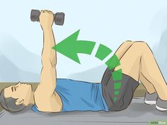 a man laying on the ground with two dumbbells in his hands and one arm up